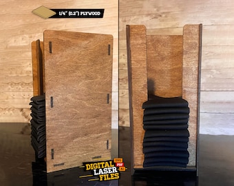 May include: A wooden face mask holder with a slot for storing face masks. The holder is made of 1/4" (0.2") plywood and is designed to hold a stack of face masks. The holder is shown with a stack of black face masks.