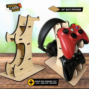 Puede incluir: Un soporte de madera para dos mandos de juego y unos auriculares. El soporte está hecho de madera contrachapada de 1/4 de pulgada (0,6 cm). El soporte se muestra con un mando de juego rojo y uno negro. El texto "BONUS SIZE VERSIONS 0.137", 0.174", AND 0.176" INCLUDED" se muestra debajo del soporte.