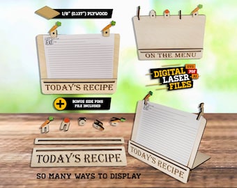 May include: A wooden recipe holder with the text "TODAY'S RECIPE" and a small carrot design. The holder can be displayed in multiple ways, including standing upright, hanging on a wall, or using side pins. The image also shows the text "ON THE MENU" and "DIGITAL LASER FILES" with the file types SVG, PDF, and AI.