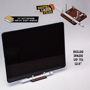 May include: A wooden and acrylic stand for an iPad or tablet, with a slot for a stylus. The stand is designed to hold iPads up to 12.9 inches. The stand is made from 1/4 inch plywood and 1/4 inch acrylic.  The stand is shown with a black iPad and a white stylus.