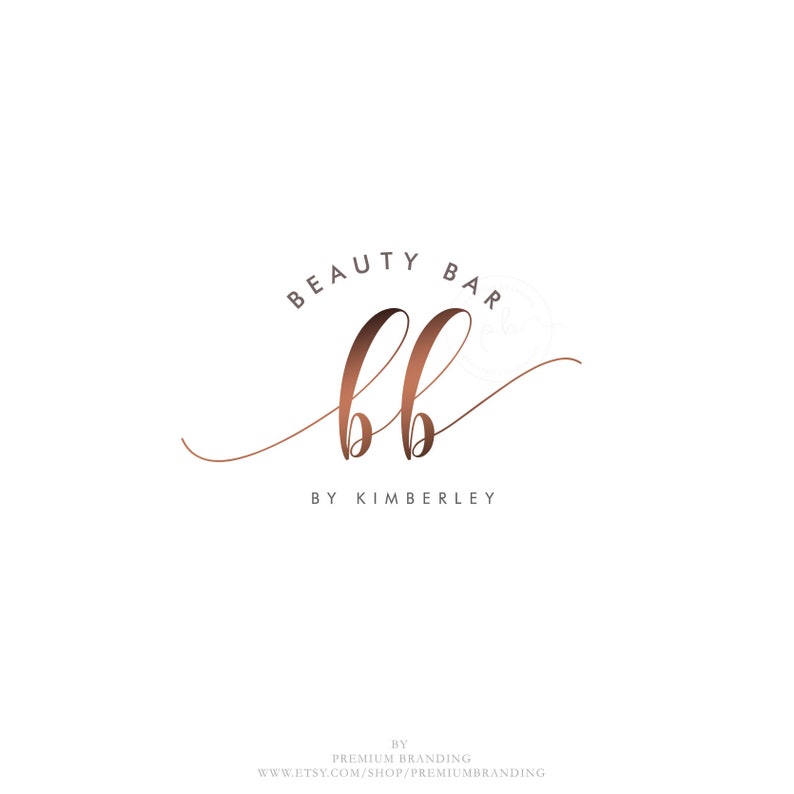 May include: A logo design for a beauty bar, featuring the words "BEAUTY BAR" in a serif font above the stylized letters "bb" in a copper color. Below the letters is the text "BY KIMBERLEY". The background is white.
