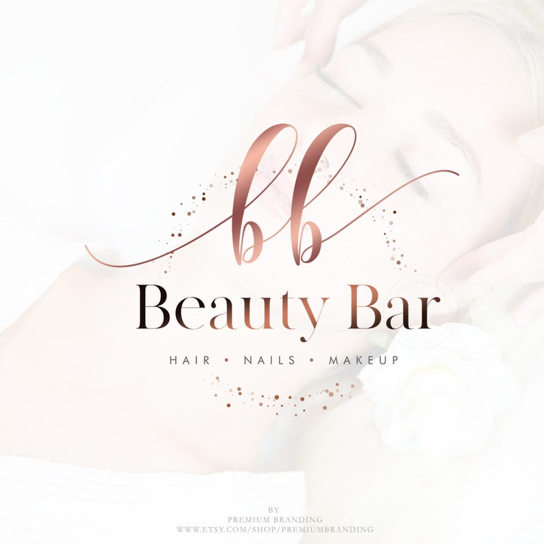 May include: Rose gold logo for a beauty bar, featuring the letters "bb" in a stylish script above the words "Beauty Bar". The logo includes the words "Hair, Nails, Makeup" below the business name. The background is a soft, blurred image.