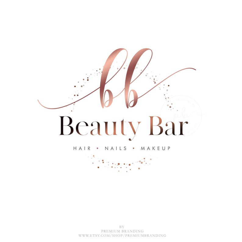 May include: A rose gold logo for a beauty business, featuring the letters "bb" in a cursive script above the words "Beauty Bar." Below, the text "HAIR &bull; NAILS &bull; MAKEUP" is displayed. The logo is set against a white background with scattered glitter.