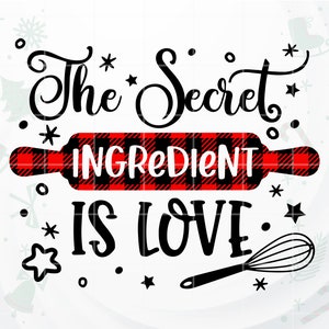 Puede incluir: Rodillo de amasar a cuadros negros y rojos con el texto "The Secret Ingredient is Love." También se muestra un batidor negro.