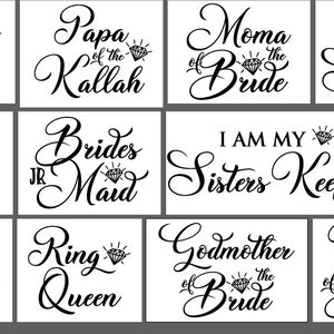 May include: A set of 10 wedding party signs with black calligraphy text and diamond illustrations. The signs include titles like "Nephew of the Groom", "Papa of the Killah", "Moma of the Bride", "Ring Security", "Mini Bride", "JR Brides Maid", "I Am My Sisters Keeper", "Grooms Crew", "Ring Queen", "Godmother of the Bride", and "Uncle of the Bride".