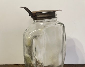 Vintage Embossed 1944 Liquor with Handle,