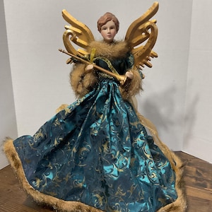 Beautiful 16 inch Angel Tree Topper with Metal Wings and a Golden Horn Turquoise Ballgown with Faux Fur Trim Porcelain Head and Hands