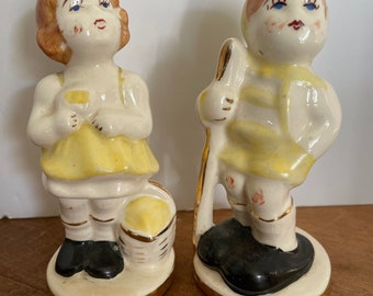 Vintage ceramic boy and girl figurines