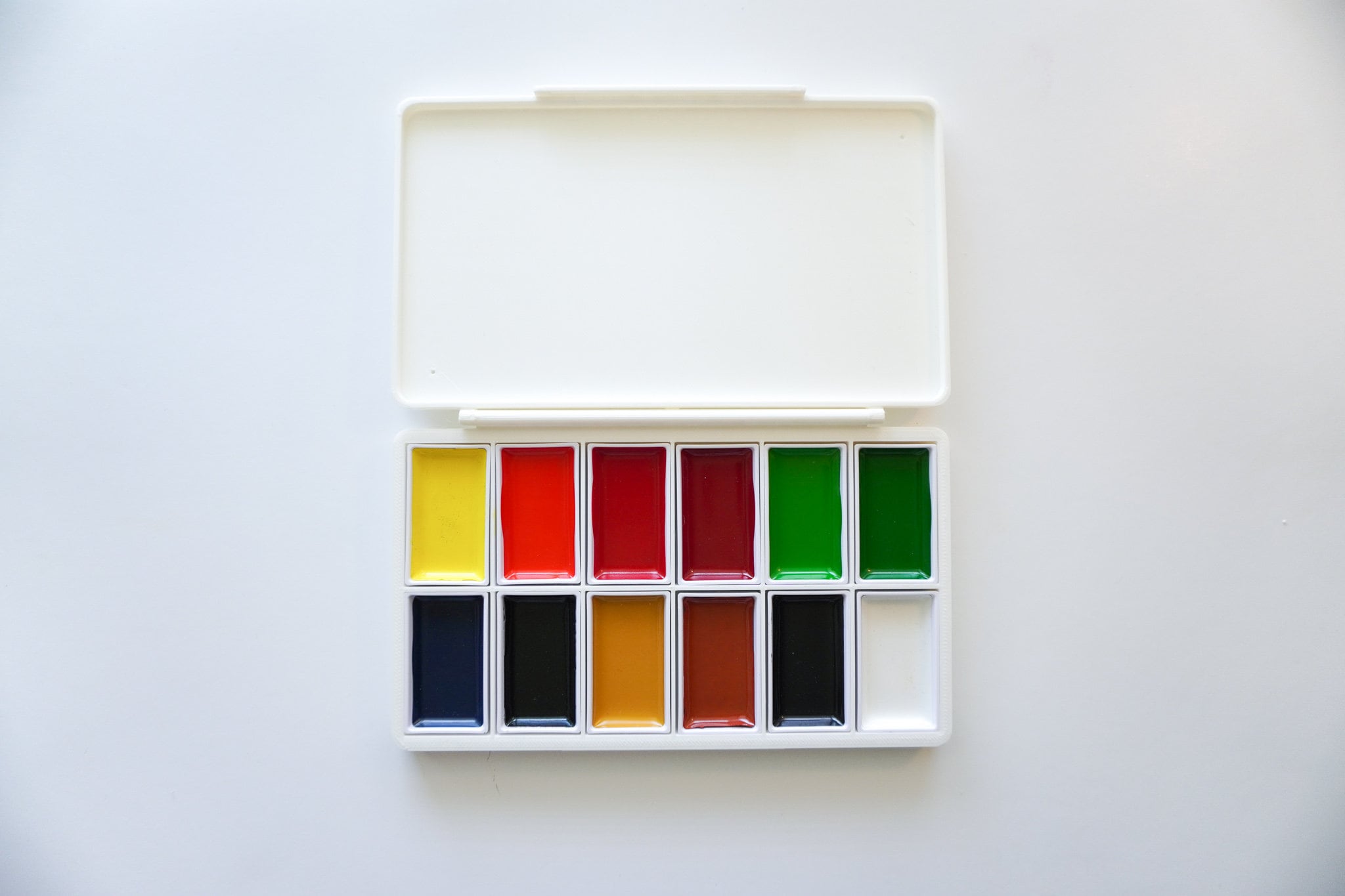 White Watercolor Palette. Empty Watercolor Tray Isolated on Wood Background  Stock Image - Image of artists, drawing: 238250329