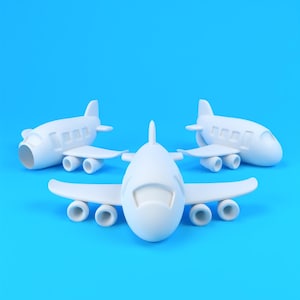 Puede incluir: Tres aviones de juguete blancos dispuestos sobre un fondo azul brillante. Cada avión tiene alas, un fuselaje y múltiples ruedas. Los aviones están orientados en diferentes direcciones, creando una composición dinámica.