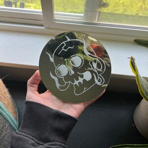 flaming skull mirror