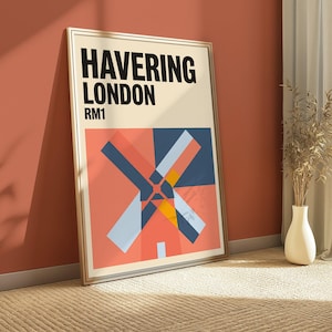 May include: A framed rectangular wall art print featuring the text HAVERING LONDON RM1 in bold black letters at the top. Below the text is a geometric graphic illustration of a windmill rendered in shades of coral, navy blue, and light blue.