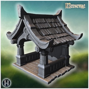 Puede incluir: Una pagoda en miniatura gris con un tejado de tejas de madera. La estructura presenta elementos arquitectónicos detallados, incluyendo aleros curvos, pilares y una cubierta de madera. La palabra "Medieval" está en la parte superior de la imagen.