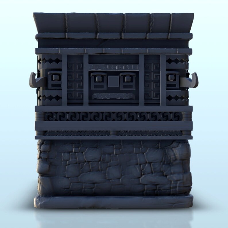 May include: A dark gray stone structure with intricate carvings and a stone base. The structure has a rectangular shape and a flat top. The carvings on the structure are in a geometric pattern.