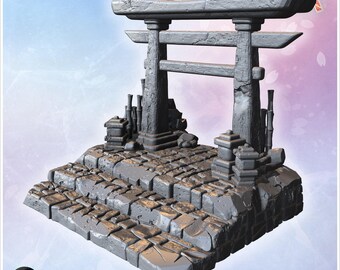 Small torii gate on stone steps with surrounding decorative bamboo and stacked rocks (5)