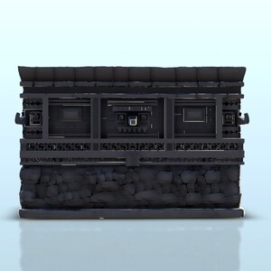 May include: A black wooden structure with a stone base and three windows. The windows have intricate carvings around them.