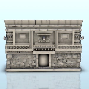 May include: A gray stone building with a carved face and two windows. The building has a stone roof and a stone base. The building is in front of a white background.