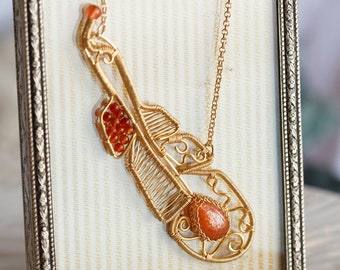 Shiny Sunstone Feather Pendant Necklace