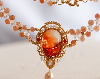 Zaria Phoenix Feathers Hematoid Quartz Necklace