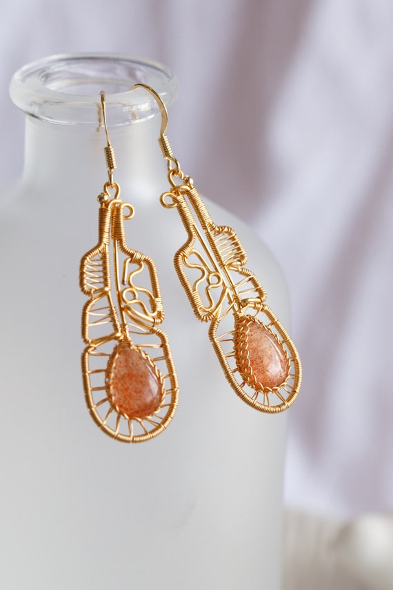 Shiny Sunstone Feather Dangle Earrings
