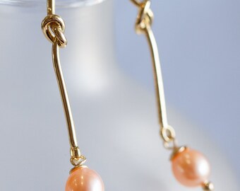 Metallic Orange Colour Pearl Love Knot Dangle Earrings