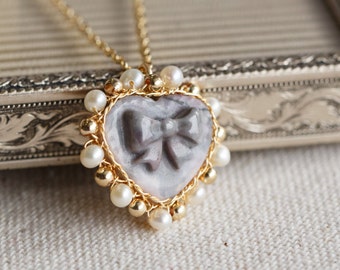 Natural Black Rhodonite Bowknot Pendant Necklace