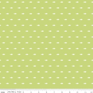 May include: A green fabric with a white repeating pattern of small fish. The fabric is 12 inches wide.