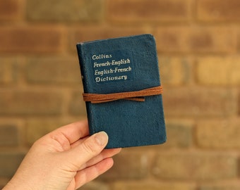 Tiny sketchbook hand bound in vintage French dictionary cover