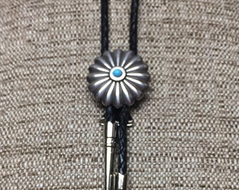 Squash Blossom Concho on Black Braided Leather Bolo Tie