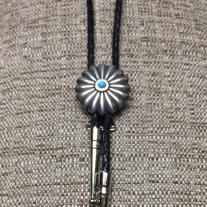 Squash Blossom Concho on Black Braided Leather Bolo Tie