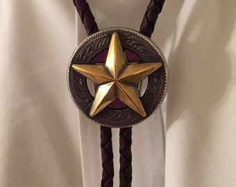 Two-Tone Texas Star Concho Bolo Tie on  Antique Dark Brown Leather Braid