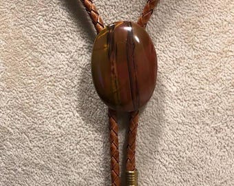 Red Creek Jasper Bolo Tie on Light Saddle Tan Braided Leather with Brass Tips