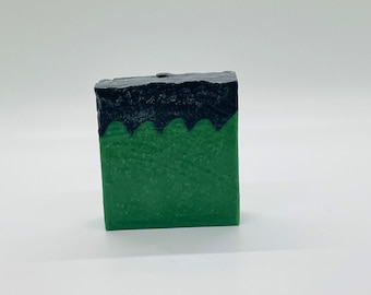 Green and Black Frankenstein soap that smells of delicious apple. Great gift for Halloween or the perfect Halloween decoration.