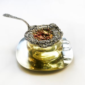 Godinger Silver plated floral over cup tea strainer - vintage