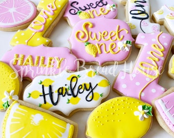 Galletas de limonada rosa - Dulces galletas de limón para el primer cumpleaños - Galletas de azúcar número uno - Recuerdos de fiesta de cumpleaños de limón rosa