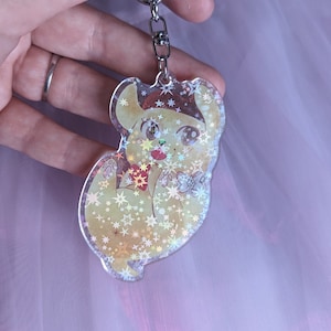 Yellow pudding dog keychain & pin