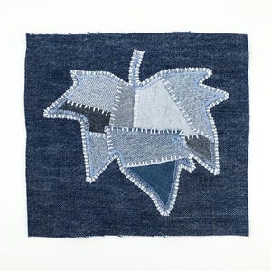 Applikation med lönnlövslappning Återvunnet denim Handsydd långsam sömnad Påsyningslapp Hantverksmässig utsmyckning Synlig lagning