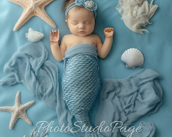 May include: A baby dressed as a mermaid, wearing a blue tail and a flower headband, is sleeping on a blue blanket with seashells and starfish.