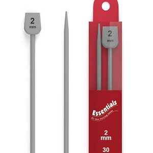 May include: A pair of grey 2 mm knitting needles, 30 cm long, packaged in a red box with the Essentials brand logo. The needles are made of metal and have a smooth finish.