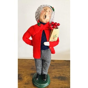 Byers Carolers 1998 Grey Hair Man With Red Coat Holding Shopping Bag 12.5” High