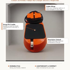 May include: An orange 3D-printed Steam Deck OLED charger holder with a black cable wrap, a snug-fit cradle for the charging brick, and a precision cutout for the plug. The text reads Steam Deck OLED Charger Holder, Cable Wrap, Snug-Fit Cradle, and Precision Cutout.