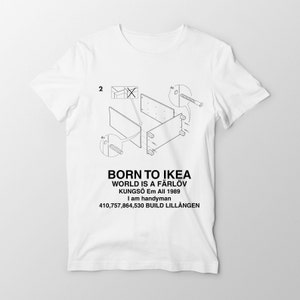 May include: White t-shirt with a black and white illustration of an IKEA assembly diagram. The text "BORN TO IKEA WORLD IS A FÄRLÖV KUNGSÖ Em All 1989 I am handyman 410,757,864,530 BUILD LILLÅNGEN" is printed on the shirt.
