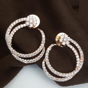 Golden CZ Stud Earrings: Brass American Diamond Studs