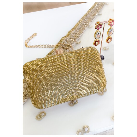 gold beaded clutch