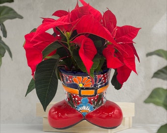 Santa boots planterTalavera put a poinsettia great gift for Christmas.