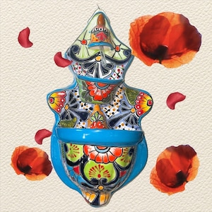 Talavera muurfontein tourquise blauw veelkleurig water komt uit de bel