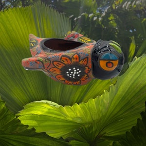 Terracotta bee planter with flowers and butterflies