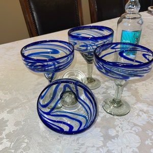 Margaritas Blue swirl Glasses Set of 2 4 and 6 Hand blown elegant   5.5” X 7” elegant Glass 16 oz sturdy and strong but beautiful.