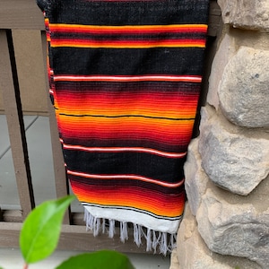 Mexican Serape Saltillo Redish orange and Black color Beautiful colors white fringe Xtra Large  86” X 62”