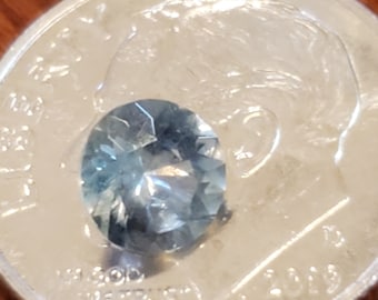 Natural Montana sapphire! Icy blue color. .78ct 5.42mm